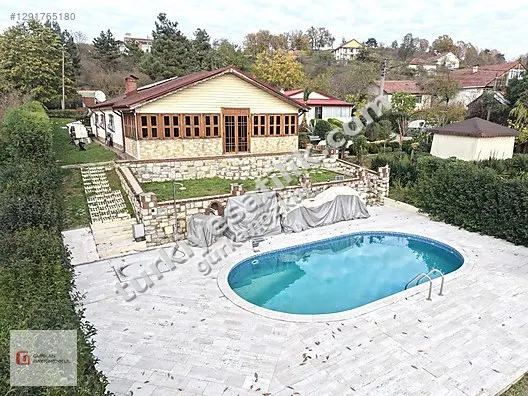 GÜRKAN GAYRİMEKUL BAYRAKTEPE MH. SATILIK HAVUZLU VİLLA